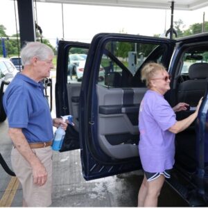 Customers enjoying the premium car wash services at Moby's Car Wash in North Augusta. Families, individuals, and car enthusiasts alike choose Moby's for the best in wash quality, value, and customer service.